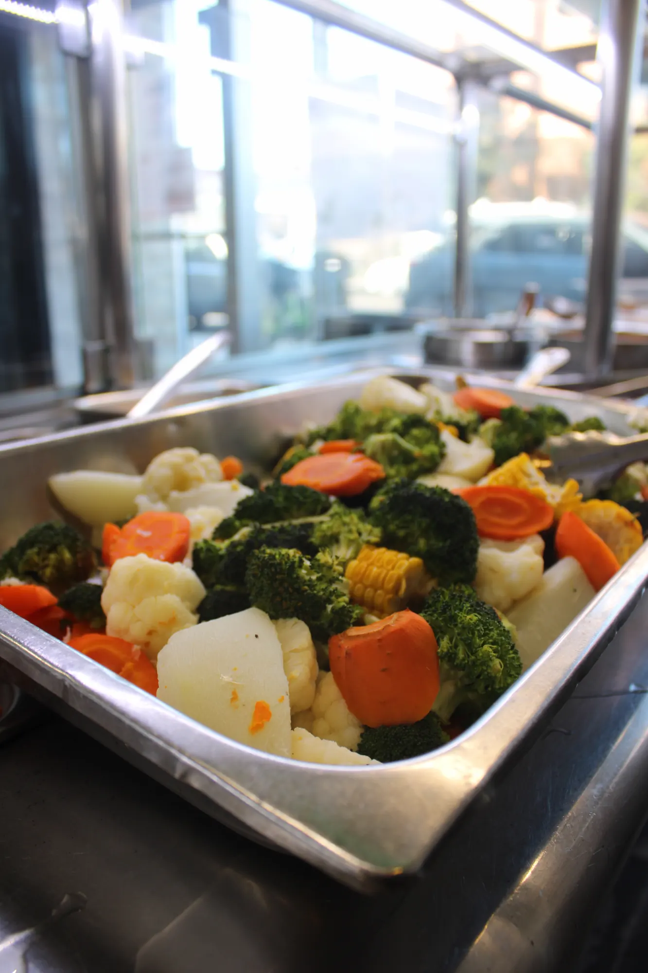 Tray of steamed vegetables
